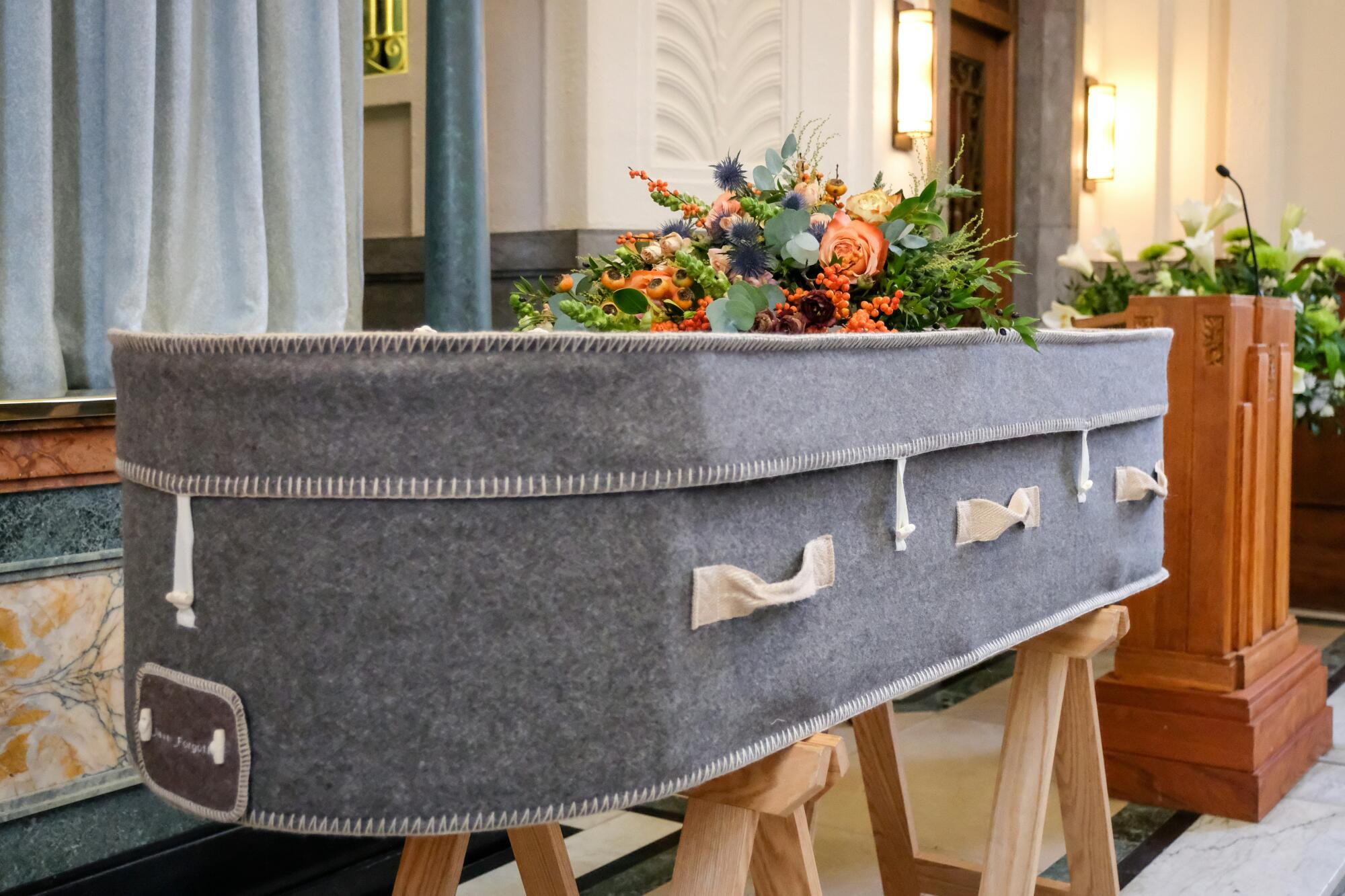 A-grey-woollen-coffin-with-cre
