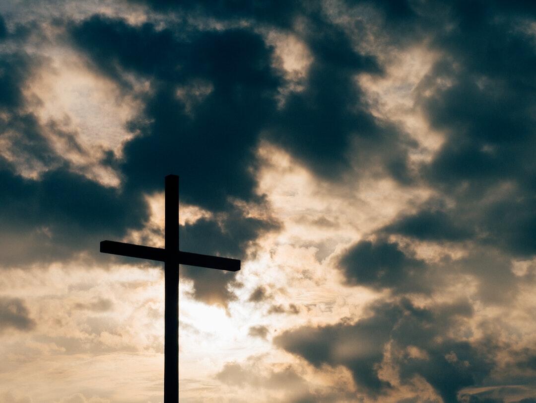 silhouette-of-cross-under-clou