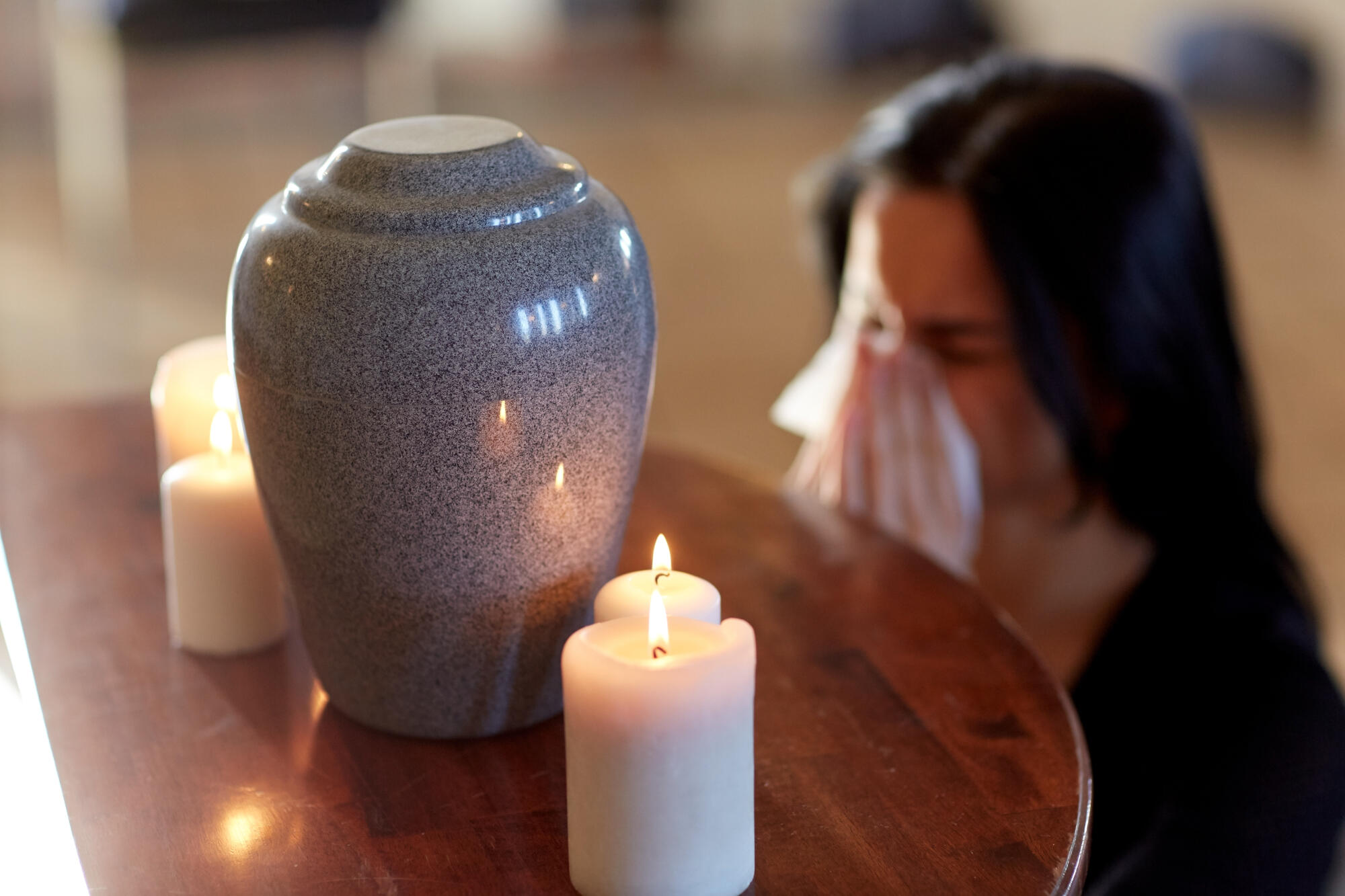 Cremation,,People,And,Mourning,Concept,-,Woman,With,Wipe,And